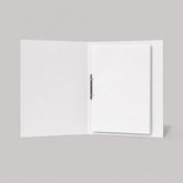 Stockka white portfolio binder with two pockets, made of laminated cardboard, for letter-size documents.