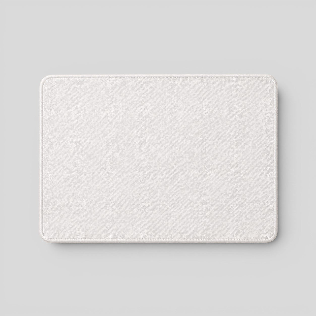 Stockka premium rectangular white mousepad with stitched edges, ideal for office and business branding.