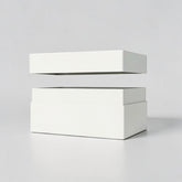 Stockka white rigid box with removable lid, ideal for luxury products, jewelry, or gifts. Cardboard material.