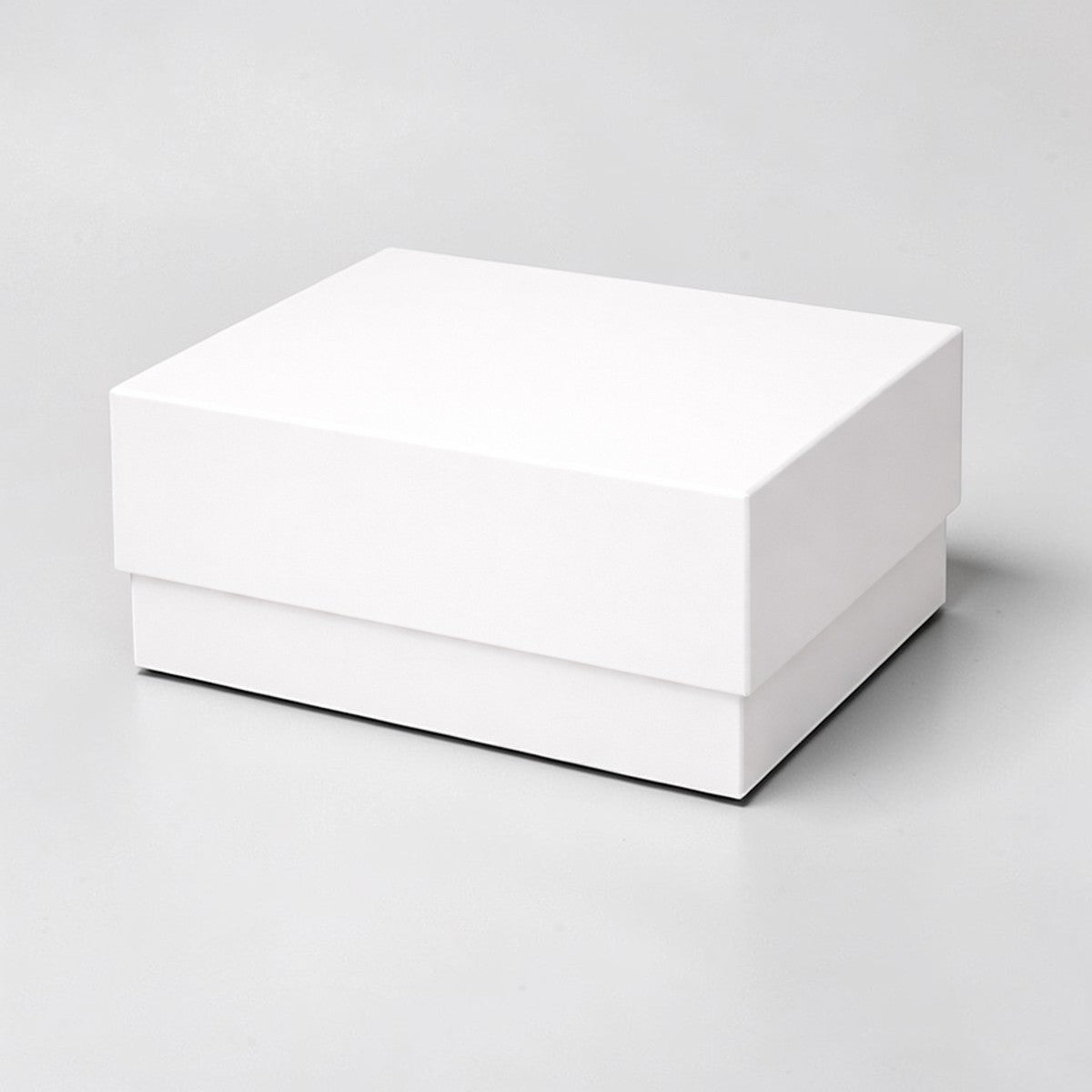 Stockka classic white two-piece rigid cardboard gift box with separate lid and base, ideal for luxury packaging.