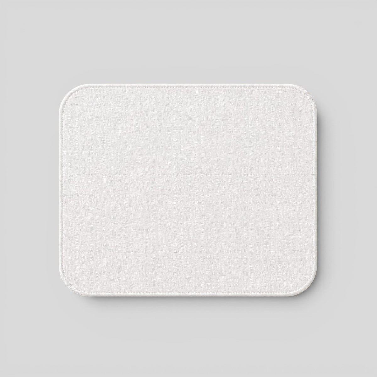 Stockka white fabric mousepad with rounded corners, ideal for precise movements and custom branding.