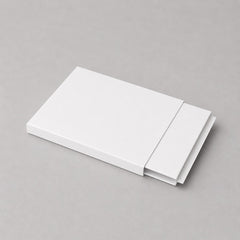 Stockka white matte cardboard slider box packaging, ideal for gift vouchers, luxury tickets, or premium promotional items.