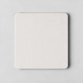 Stockk, white square mousepad with rounded corners and textured surface, modern design for a clean desk.