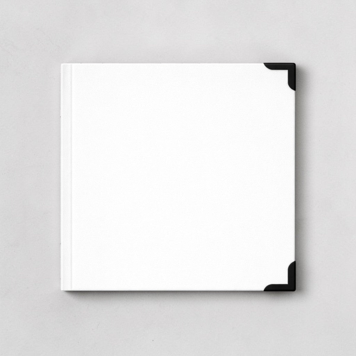 Stockka white square hardcover notebook with 80 lined pages and black corner protectors. Customizable design.