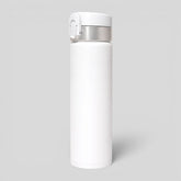 Stockka white stainless steel thermal bottle with flip-top lid and silver accent, perfect for travel and daily use.