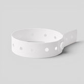 Stockka white vinyl wristband with secure snap closure and adjustable holes, ideal for events and limited entry.