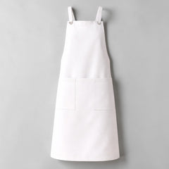 Stockka white cotton-polyester blend work apron with two large front pockets and metal ring shoulder straps.