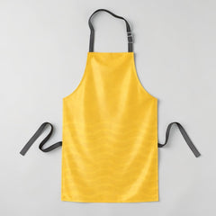 Stockka yellow waterproof polyester apron with adjustable neck strap and long waist ties, ideal for kitchens and cleaning.