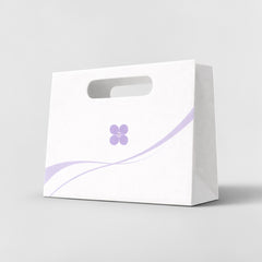 Paper carrier bag with cut-out handle