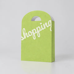 Shopping paper bag with rounded cut handle