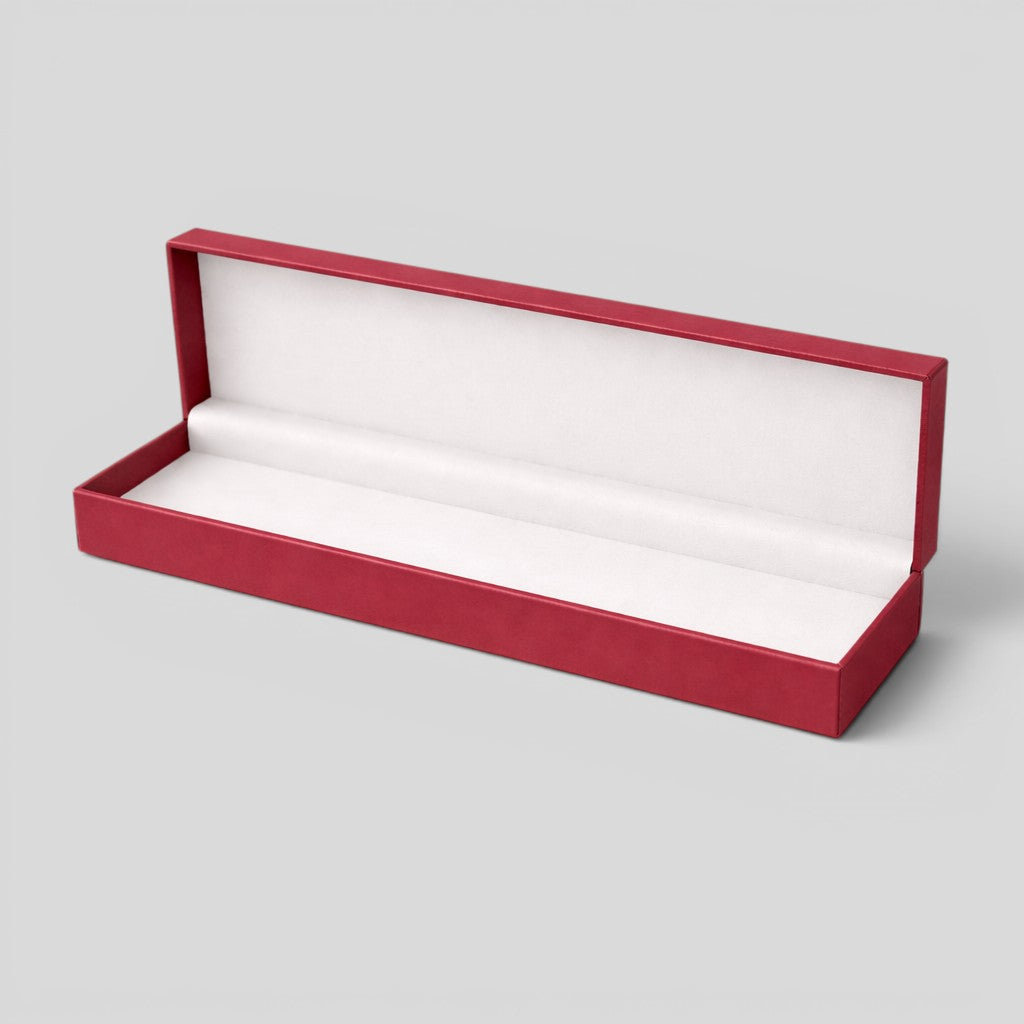 Stockk red rectangular jewelry box with hinged lid and soft white interior lining, ideal for necklaces, bracelets, or watches.