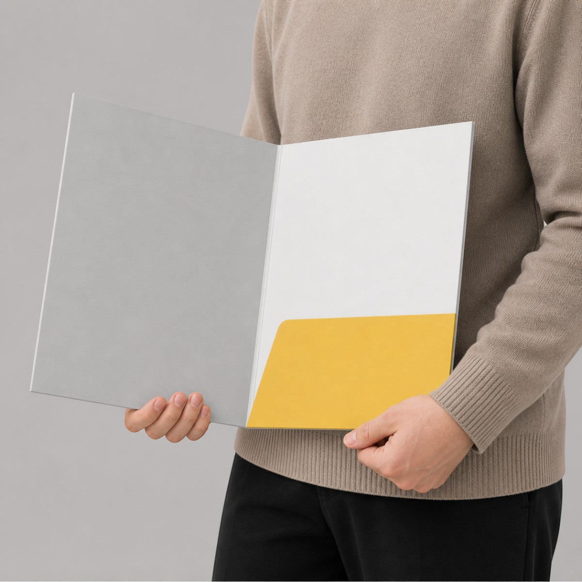 Stockka A4 office folder in grey and yellow, made of cardboard, with an internal pocket and side opening.
