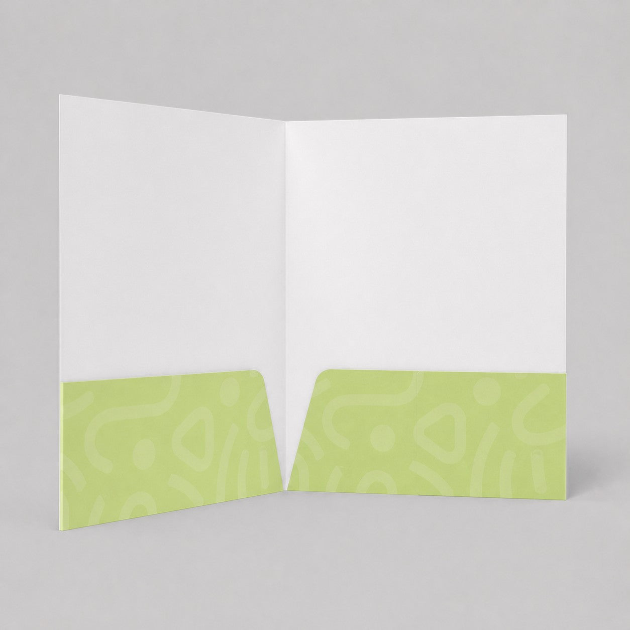 Stockka A4 project folder with two pockets, white with a light green abstract pattern on the pockets.
