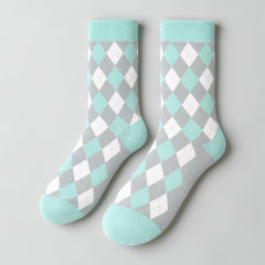 Stockka mid-calf socks with argyle pattern in grey, white, and mint green. Cotton blend.