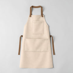 Stockka full-length beige cotton-polyester blend apron with two pockets and brown straps. Ideal for kitchens, workshops, cafes.