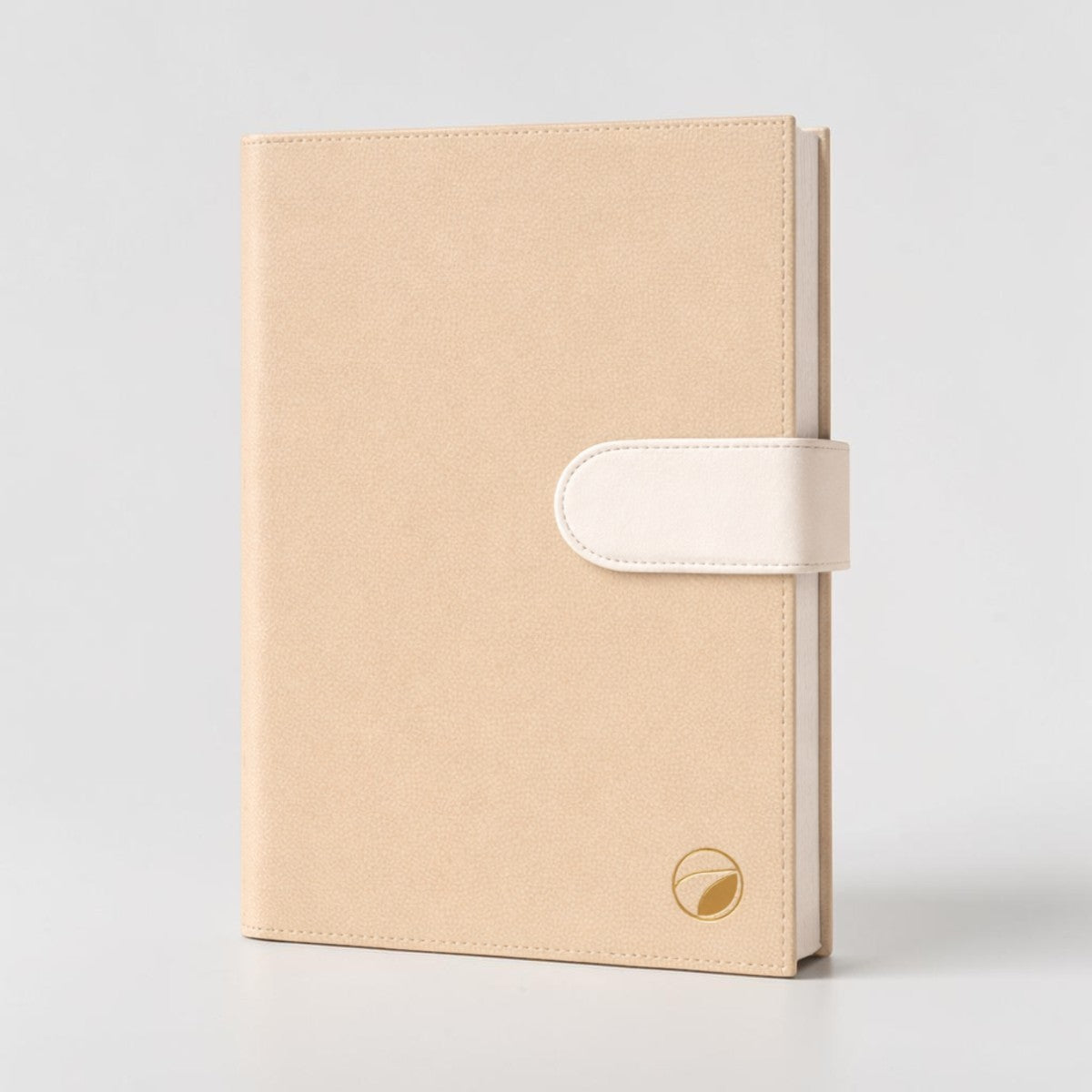 Stockka luxury beige faux leather notebook with white magnetic closure and 80 lined pages. Customizable design.
