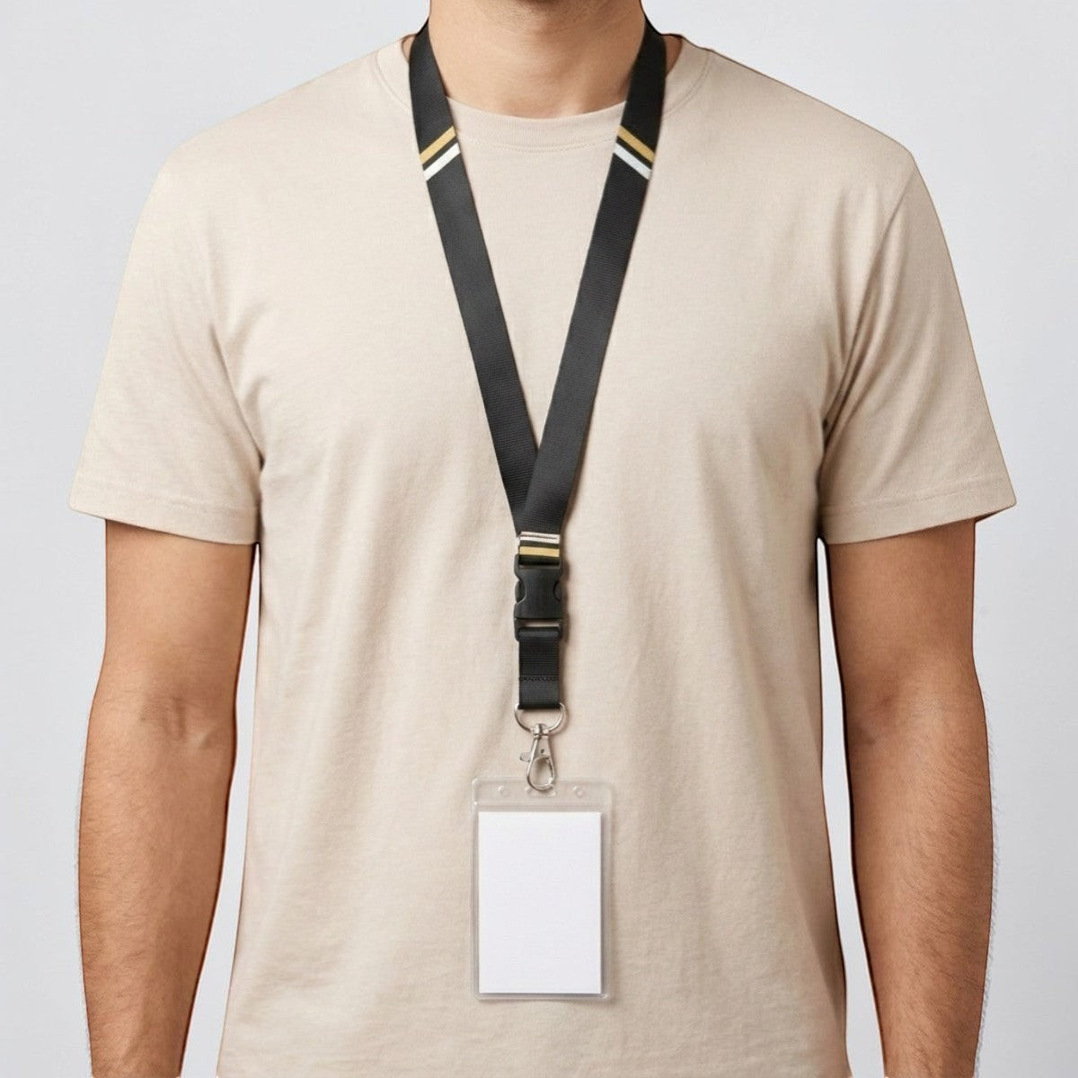 Stockka black polyester lanyard with V-design, quick-release buckle, and gold/white stripes. Includes clear ID card holder.