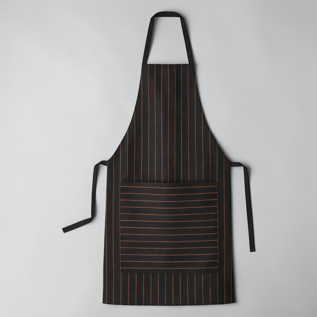 Stockka black apron with orange pinstripes, large front pocket, and adjustable neck strap. Made of poly-cotton blend.