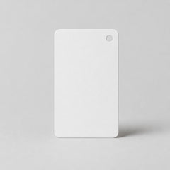 Stockka white blank rectangular hang tag with rounded corners and a hole punch at the top right corner.