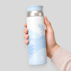 Stockka insulated stainless steel water bottle with a blue floral design and a convenient spout lid.