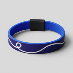 Stockka blue silicone NFC wristband with white wave design and black clasp. Water-resistant and durable.
