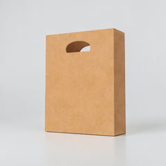 Stockka brown kraft paper shopping bag with die-cut handle, ideal for retail and branding.