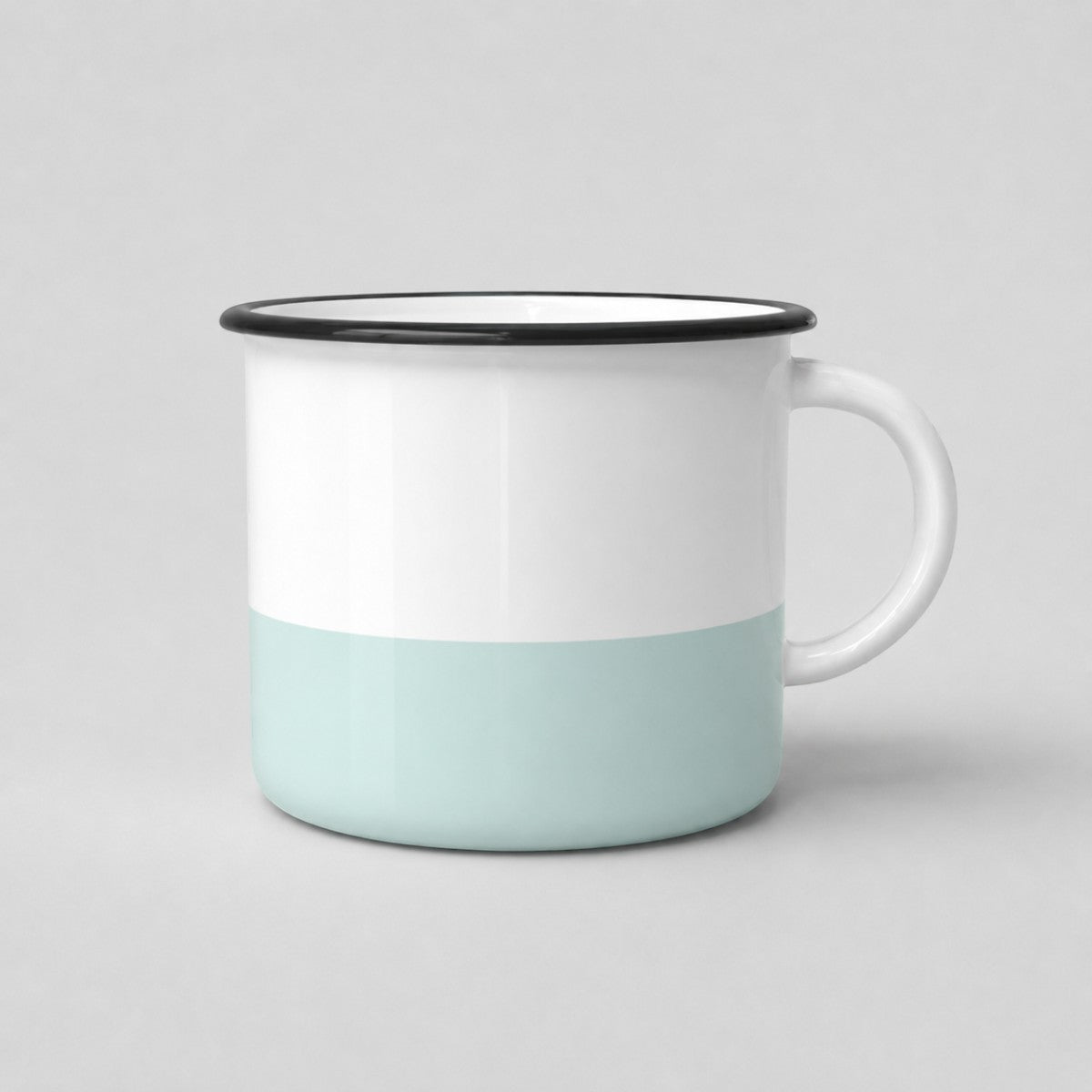 Stockka ceramic camping-style mug in white and light blue with a black rim and compact handle