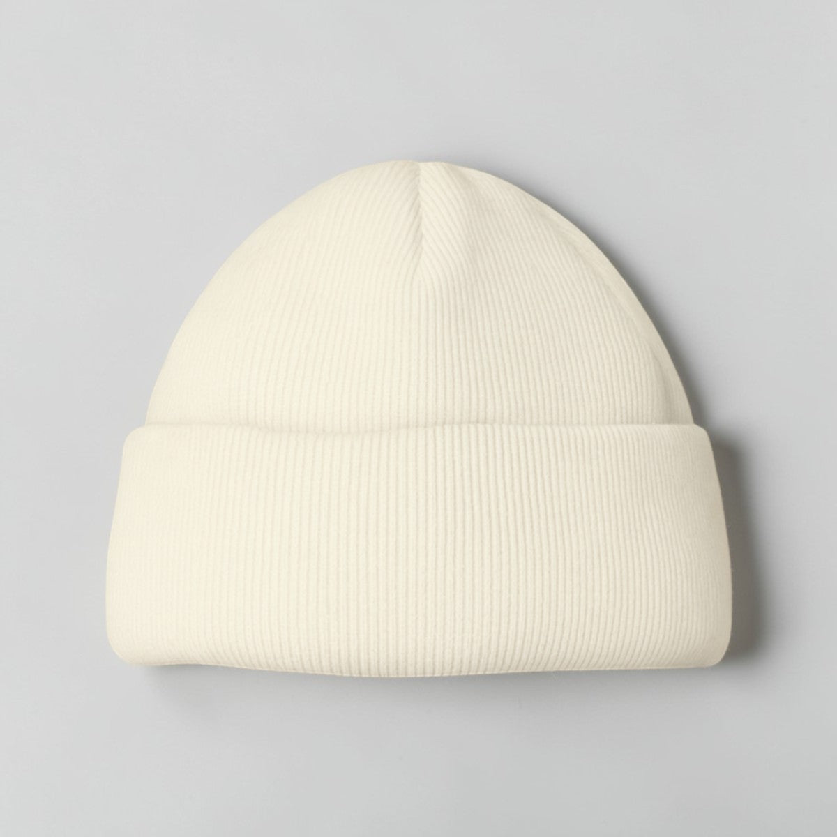 Stockka cream acrylic ribbed knit beanie. Unisex, double-knit for warmth and style.