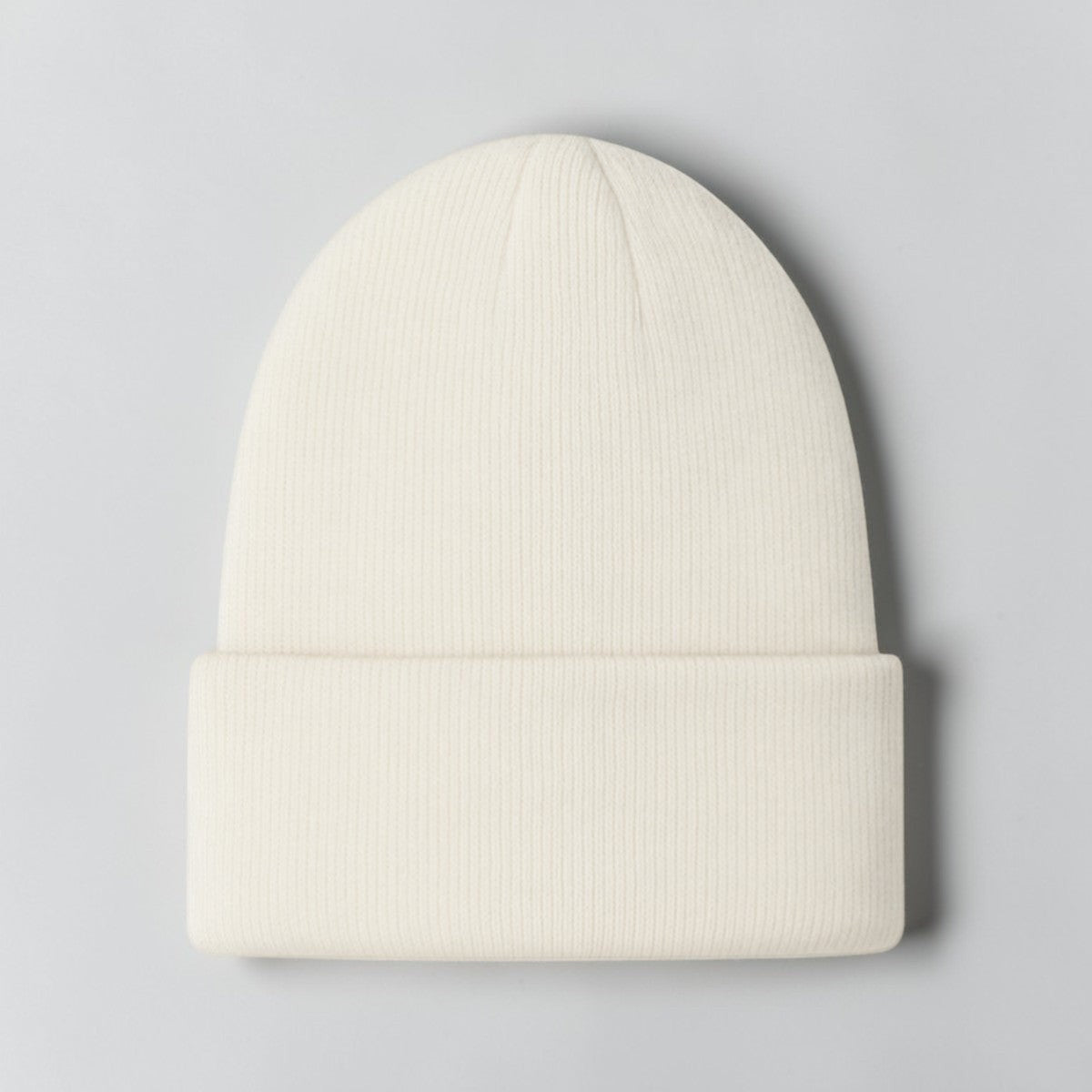 Stockka cream acrylic knit beanie with a folded cuff, perfect for winter warmth and style.