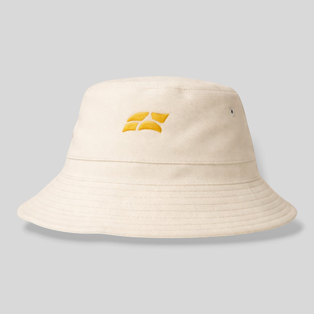 Stockka cream cotton blend bucket hat with yellow embroidered logo, ideal for beach, golf, and outdoor activities.