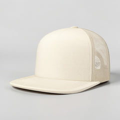 Stockka cream cotton mesh trucker hat with flat brim and structured front panel.