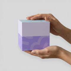 Stockka cubic gift box with top closure, two-tone purple and light blue with abstract pattern. Made of sturdy laminated cardboard.