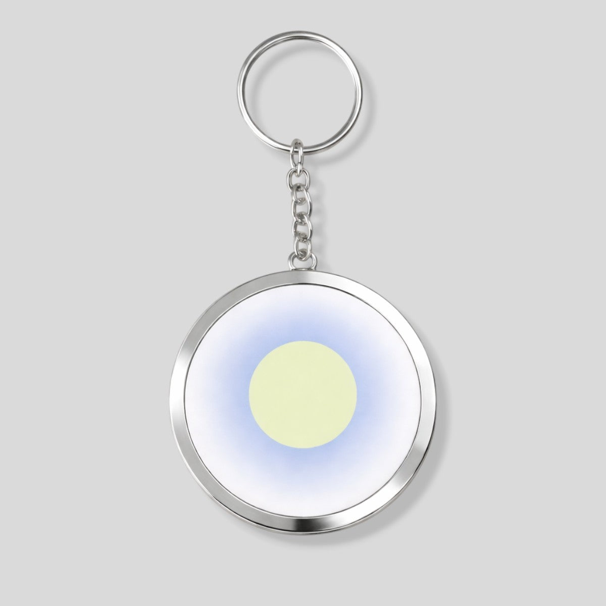 Stockka custom framed round acrylic keychain with metal chain, featuring a light yellow circle on a blue gradient background.