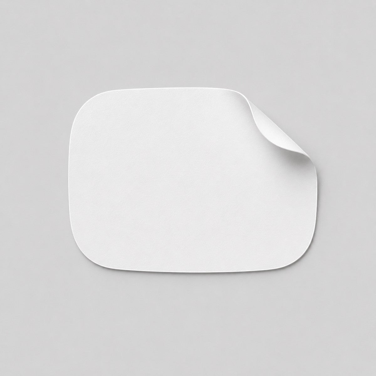Stockka white custom shape sticker with rounded corners, ideal for branding products and packaging.
