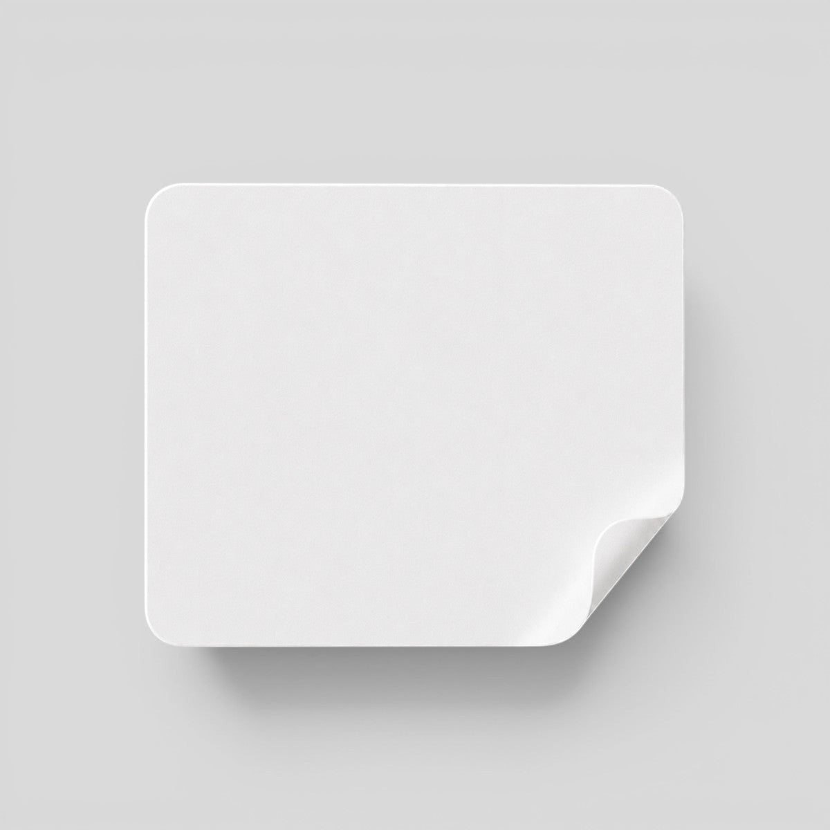 Stockka white square sticker with rounded corners, ideal for custom branding on products and packaging.