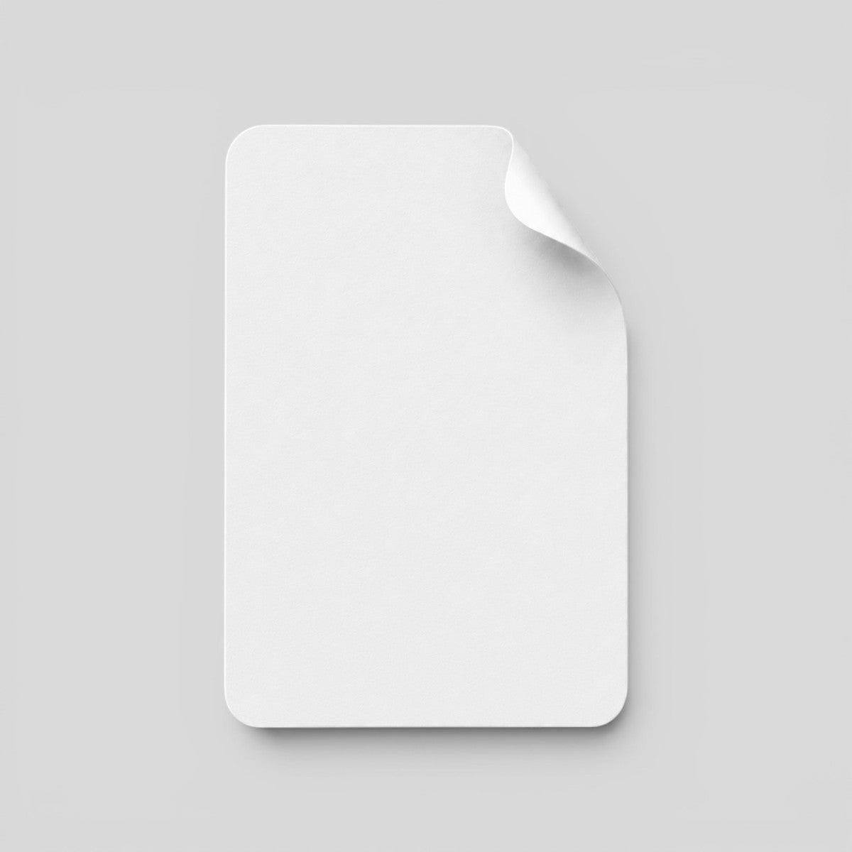 Stockka vertical custom sticker with rounded corners and a peel-off corner, made of coated paper.