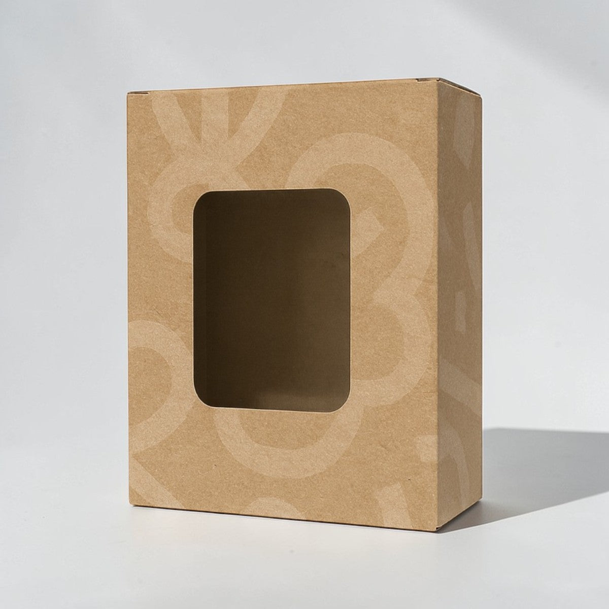 Stockka rectangular cardboard box with wide front display window and subtle pattern, ideal for retail packaging.
