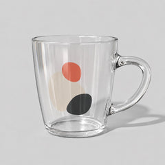 Stockka 475ml clear glass mug with a flared design and abstract red, beige, and black circular pattern.
