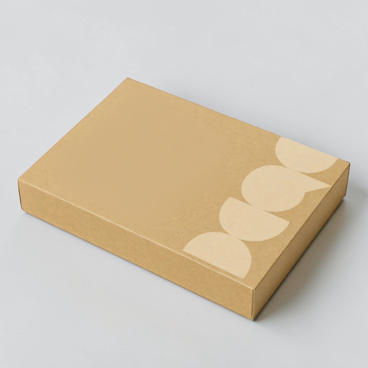Stockka flat cardboard box mockup for board games, catalogs, or printed sets. Features a classic design with a full lid for safe shipping and branding.