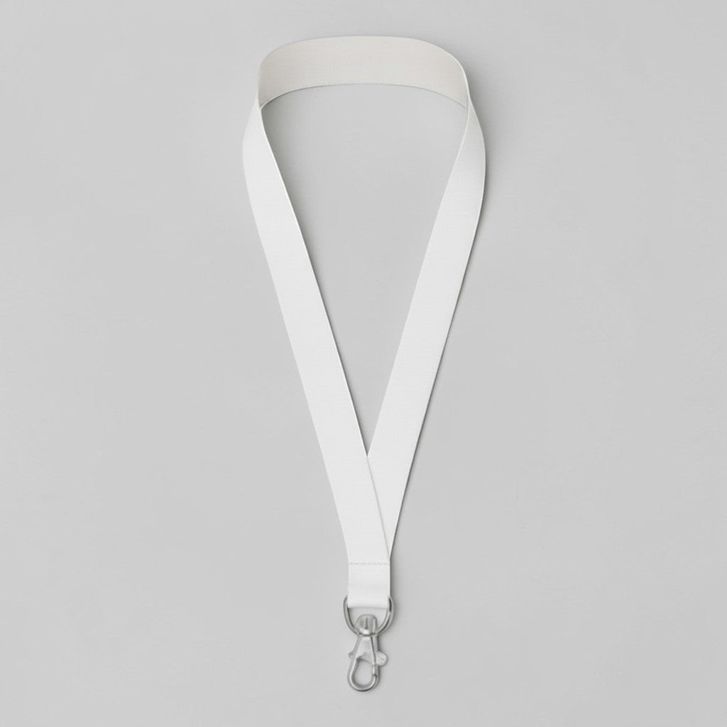 Stockka flat white polyester lanyard with metal swivel clip and geometric pattern, ideal for events and ID badges.