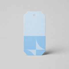 Stockka light blue and blue geometric pattern gift tag with hole punch