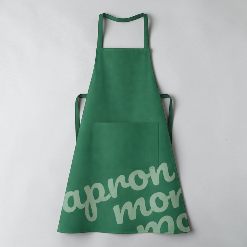 Stockka standard green polyester-cotton blend apron with front pocket and adjustable straps.