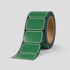 Stockka green rectangular stickers with rounded corners on a roll, ideal for product branding and packaging.