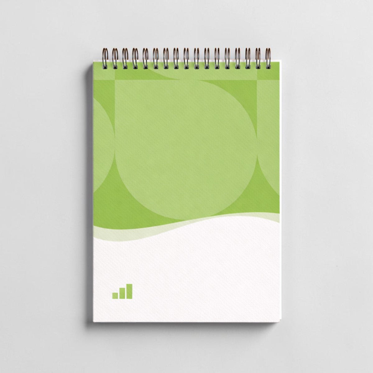 Stockka green spiral notebook with 80 lined pages and customisable design. Soft cover.