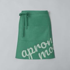 Stockka green polyester-cotton blend waist apron with front pocket and long ties for cafes and restaurants.