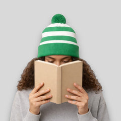 Stockka green and white striped acrylic knit beanie with pom-pom. Unisex winter hat.