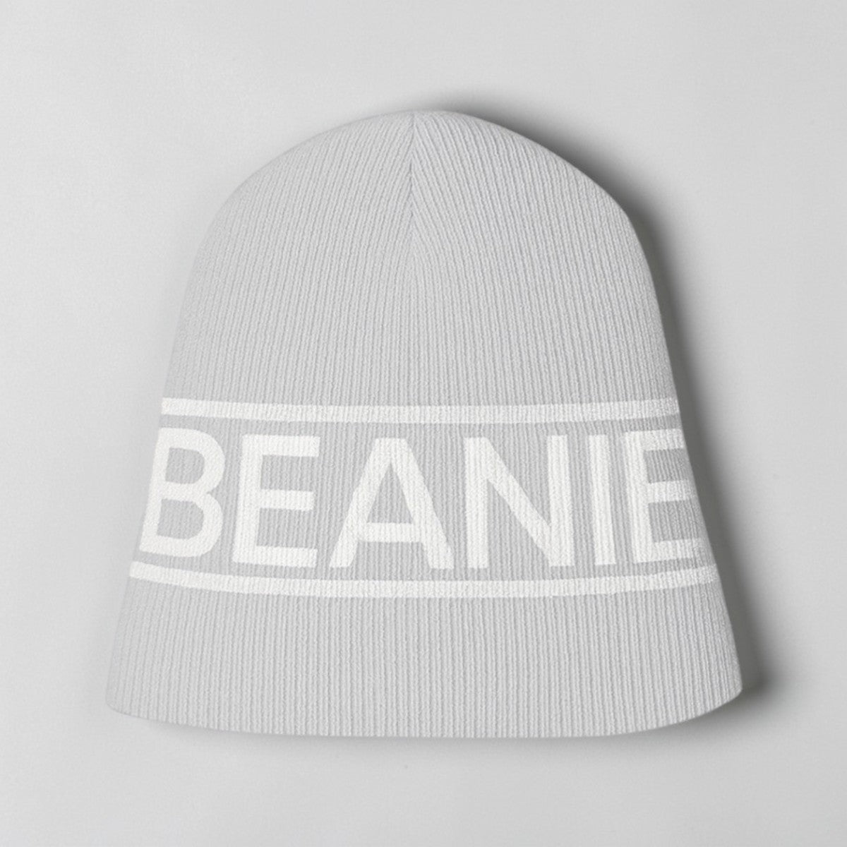Stockka light grey acrylic double knit beanie with white "BEANIE" text band. Unisex winter hat.