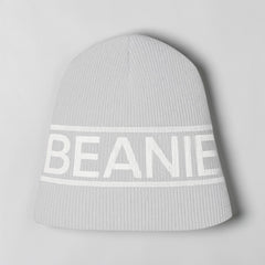 Stockka light grey acrylic double knit beanie with white "BEANIE" text band. Unisex winter hat.