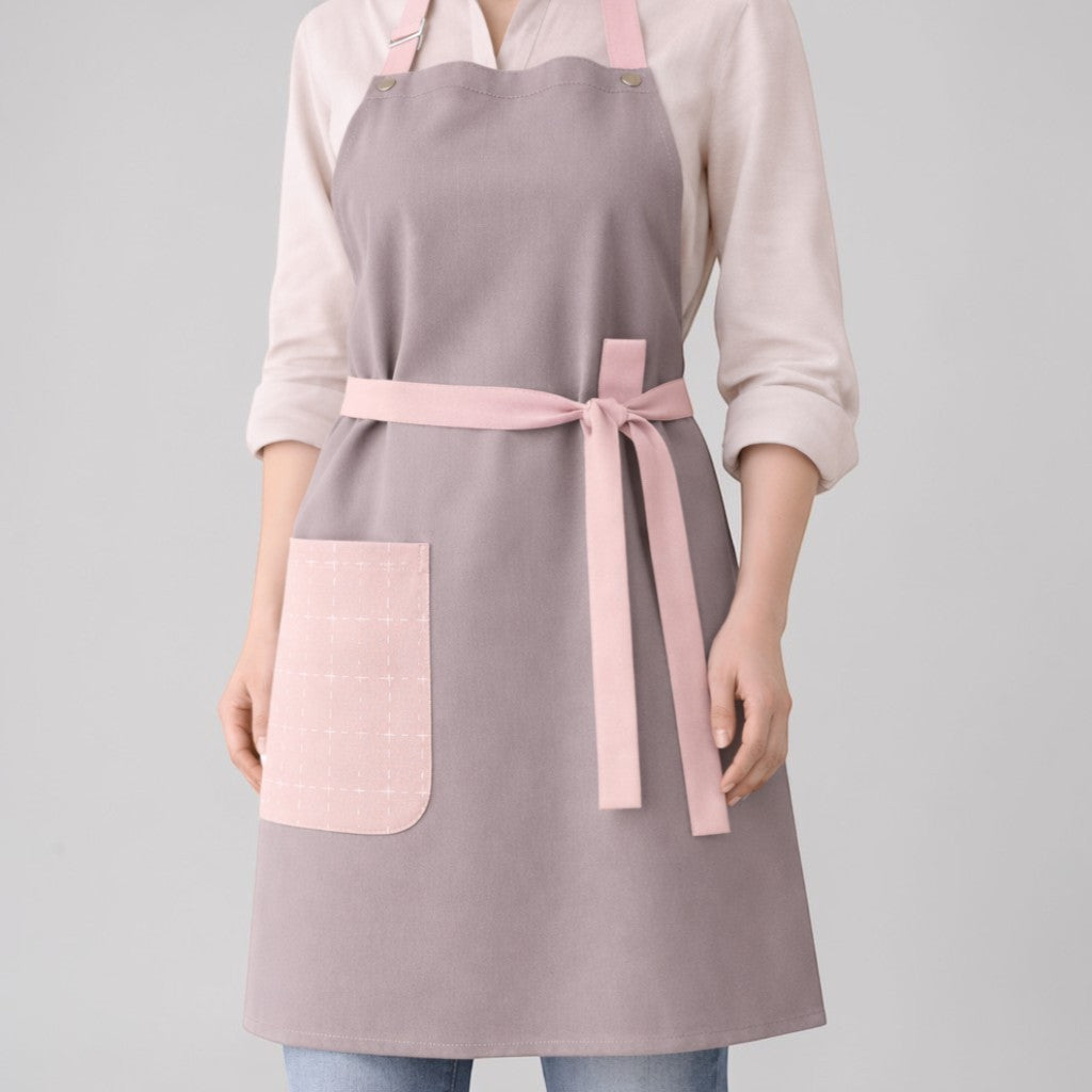 Stockka elegant grey cotton-polyester blend apron with pink trim and pocket, adjustable neck strap, waist tie.
