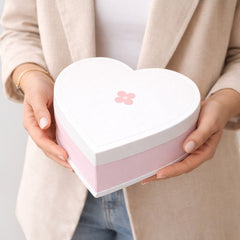Stockka white and pink heart-shaped gift box with a small pink flower design, made of rigid cardboard.